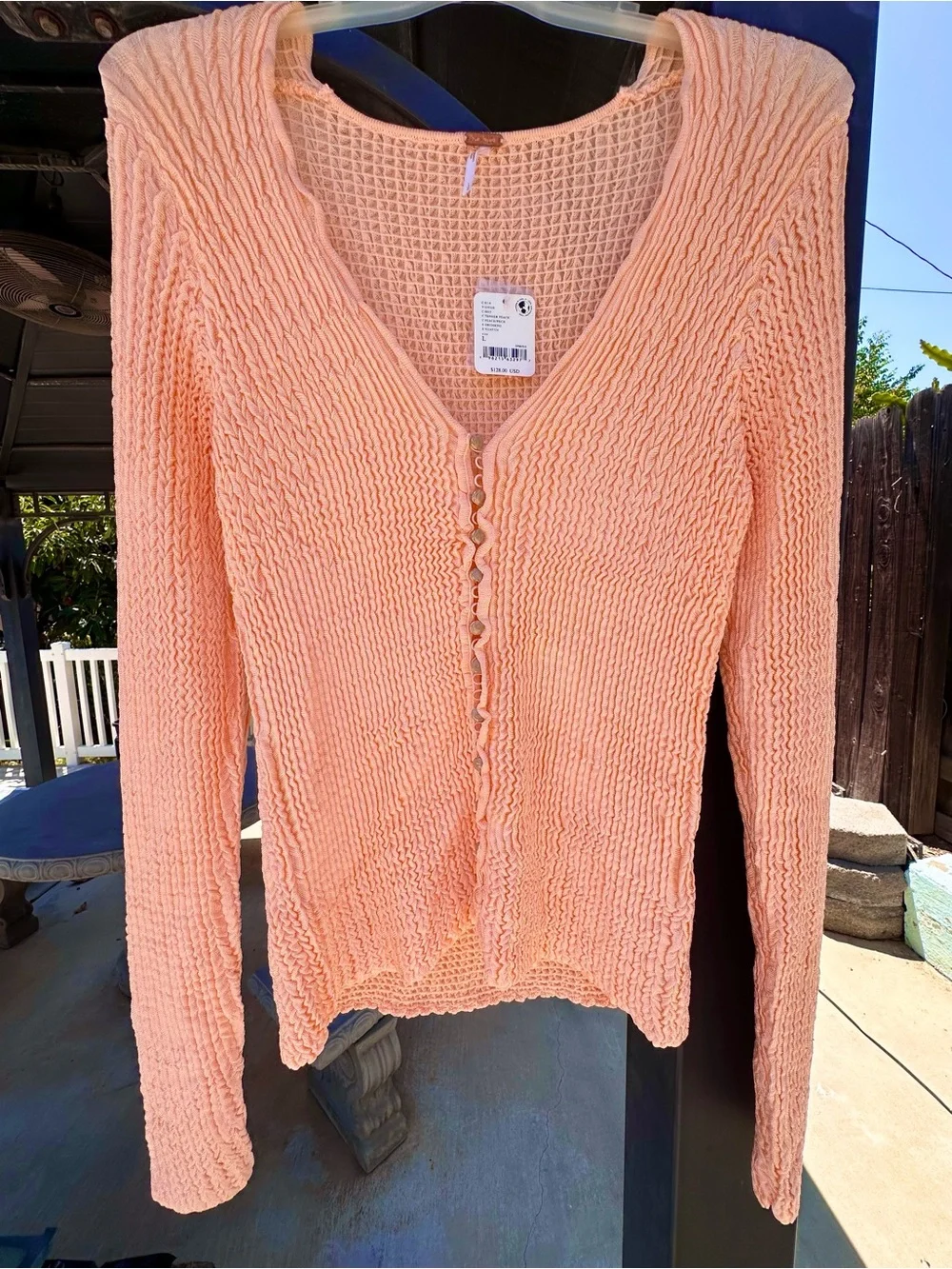 NWT FREE PEOPLE PUCKER UP PEACH CARDIGAN SIZE LARGE!!